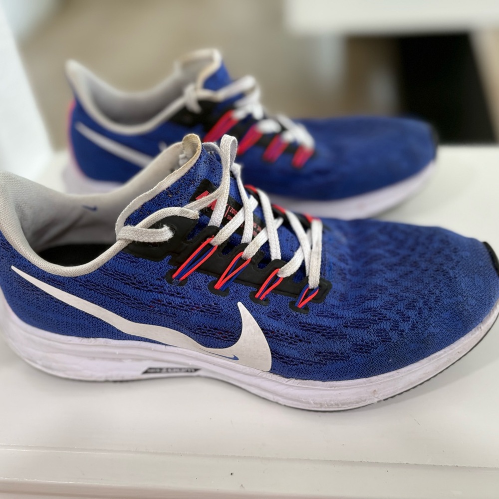Nike Blue Athletic Sneakers with White and Red Details